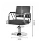 Black barber chair with gold armrests