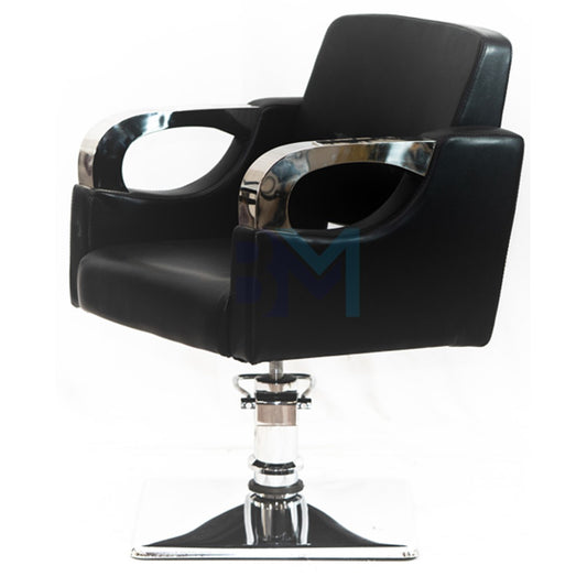 Black hairdressing chair with chromed metal armrests