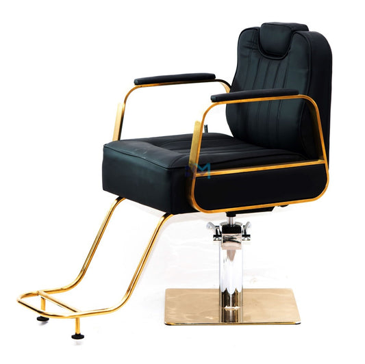 Black hairdressing chair with armrests and gold base